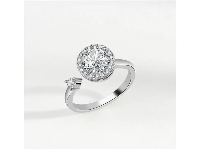 Antistresový prsten s otočným kamenem ve stříbrné barvě  nastavitelná velikost, nerezová ocel