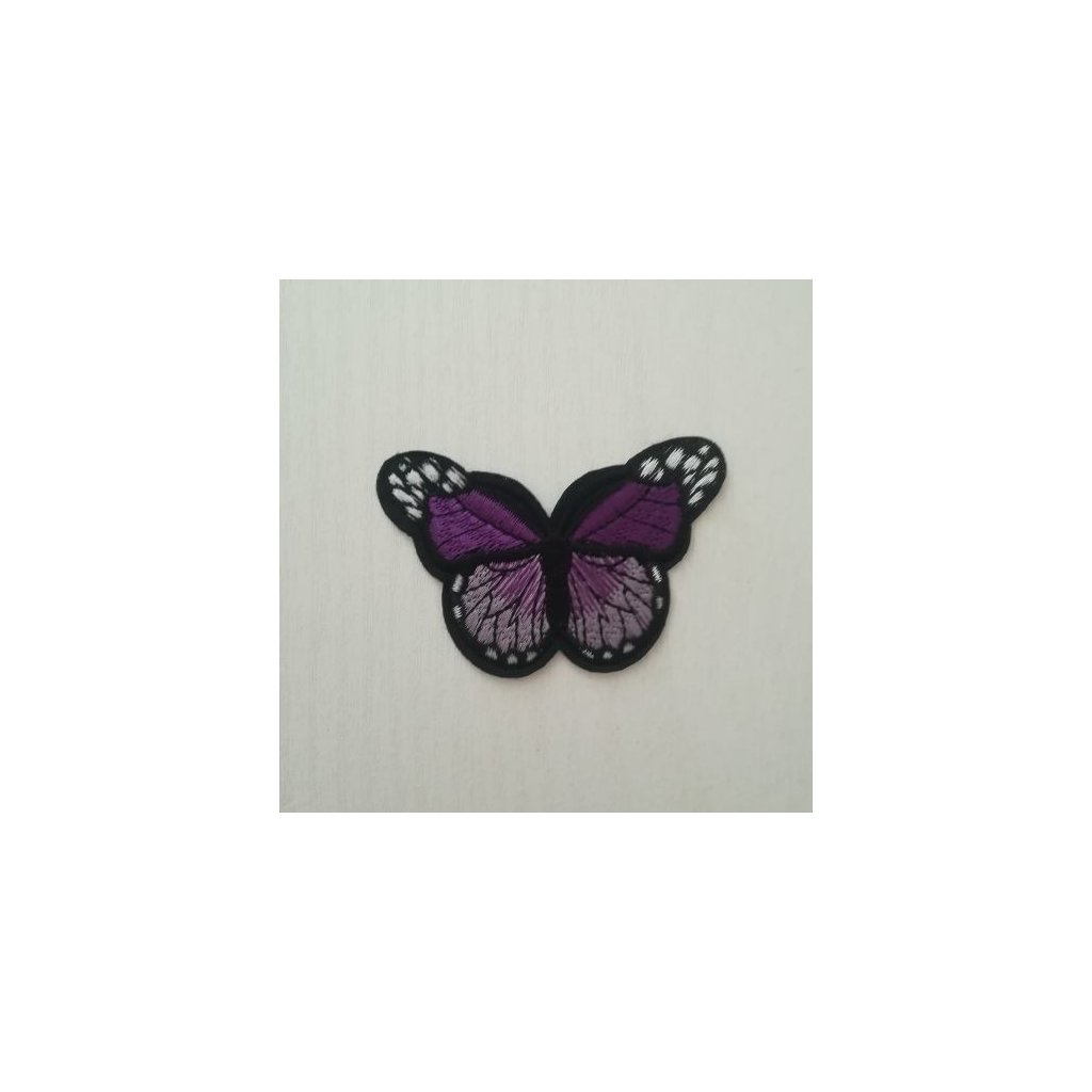 Nažehlovačka - motýľ fialový