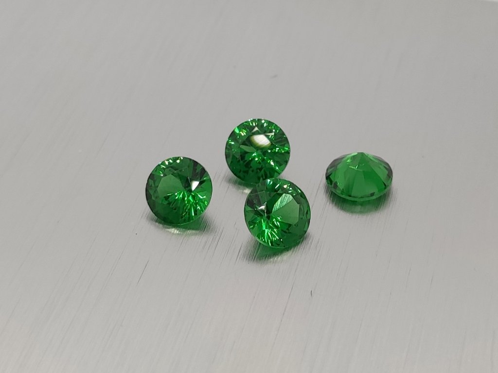 Glas synthetisches  rund 6 mm farbe grün facettiert