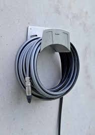 Nástěnný držák hadic plechový Obrázek