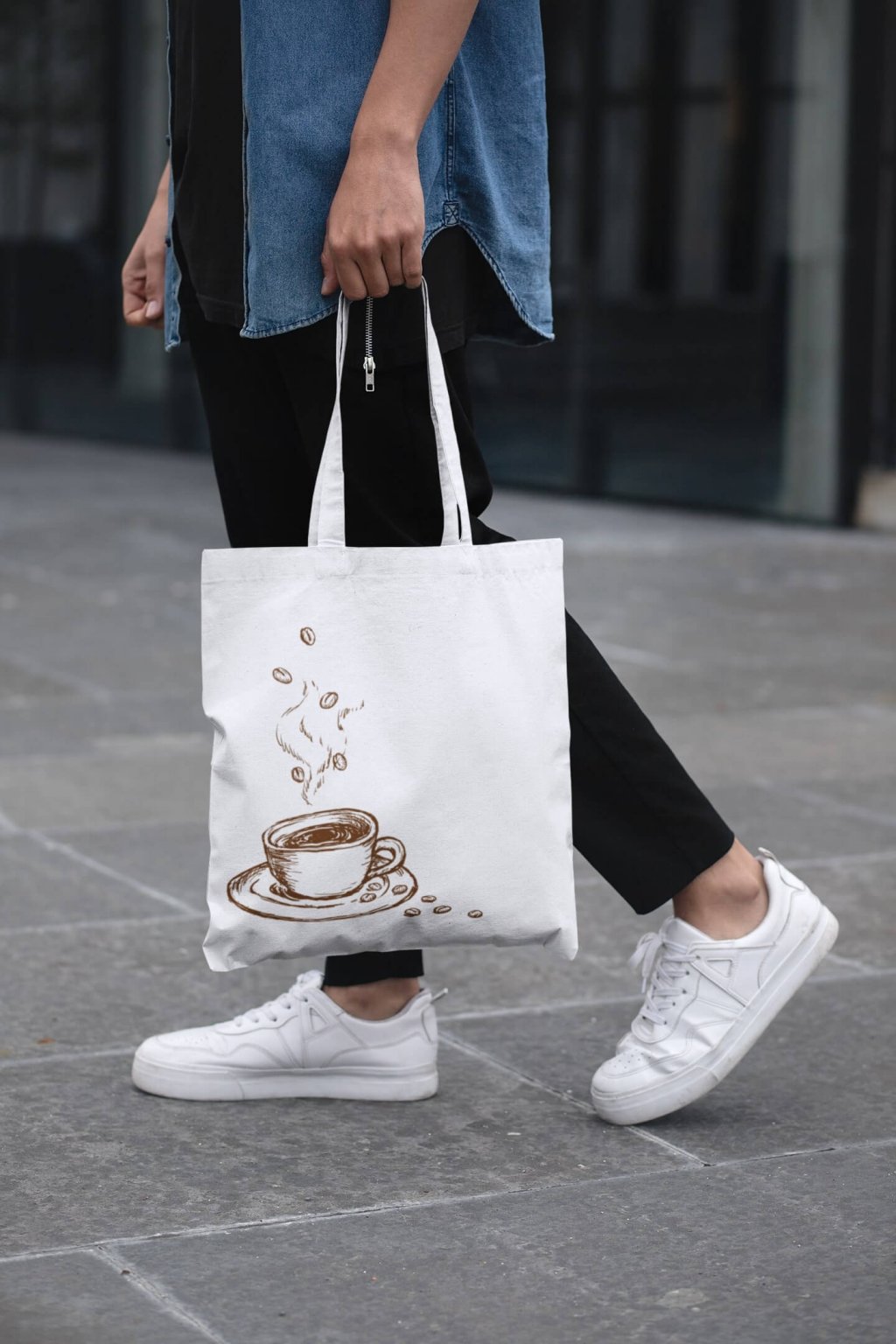 cropped face mockup of a man holding a tote bag in the street 29424 (2)