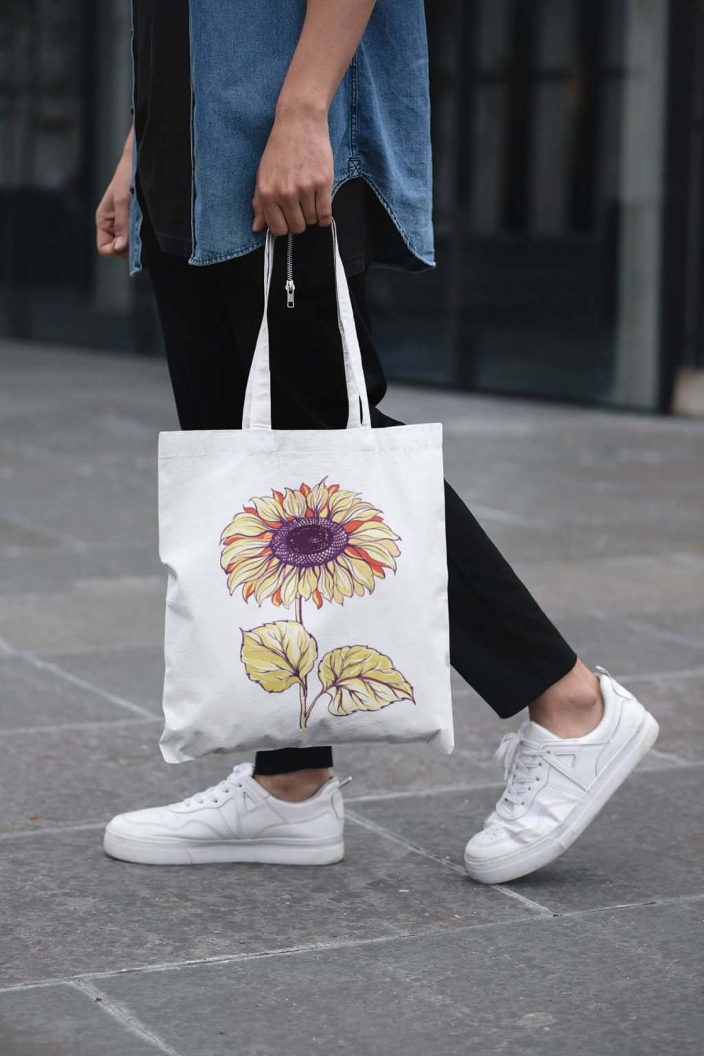 cropped face mockup of a man holding a tote bag in the street 29424 (6)