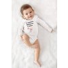 long sleeve onesie mockup of a happy baby lying over a soft cloth m978 (2) (1)