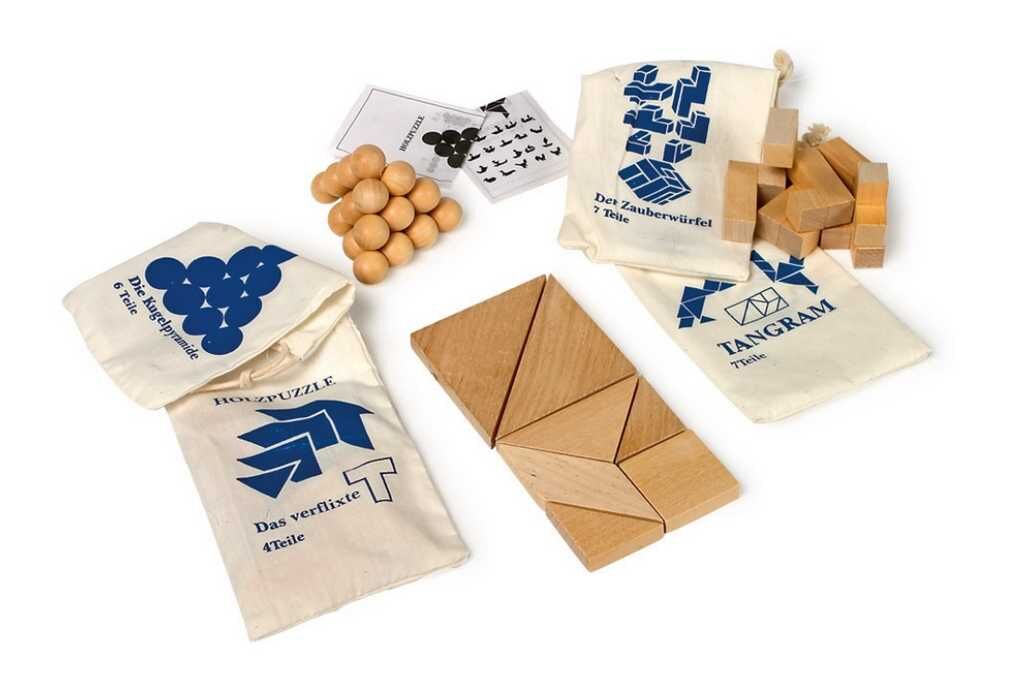 Small Foot Dřevěné hlavolamy set 4ks v pytlících Obrázek