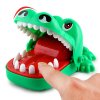 krokodýl zubař ruka