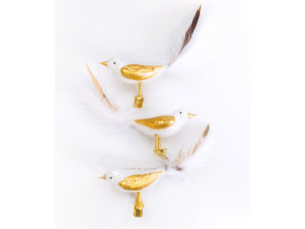 Bílý ptáček se zlatými křídly a zobákem